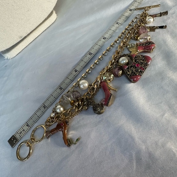 Goldtone and pink enamel charm statement bracelet - Picture 3 of 5